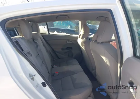 2012 Honda Insight from USA, damaged, VIN JHMZE2H37CS005710